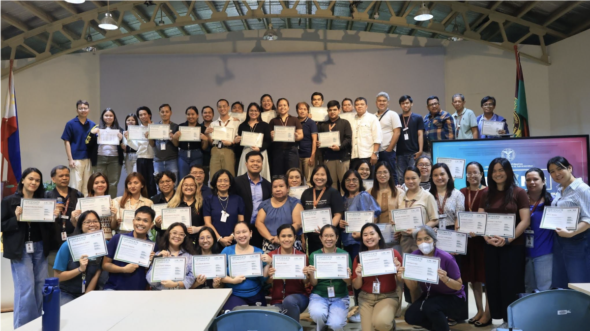 Completers of the second batch of LINANG UPOU: Mga Serye ng Pagsasanay para sa Pagpapaunlad ng Paglilingkod sa Pamantasan at Bayan, together with the workshop facilitators, pose with their certificates on the third and last day, 9 July 2026.